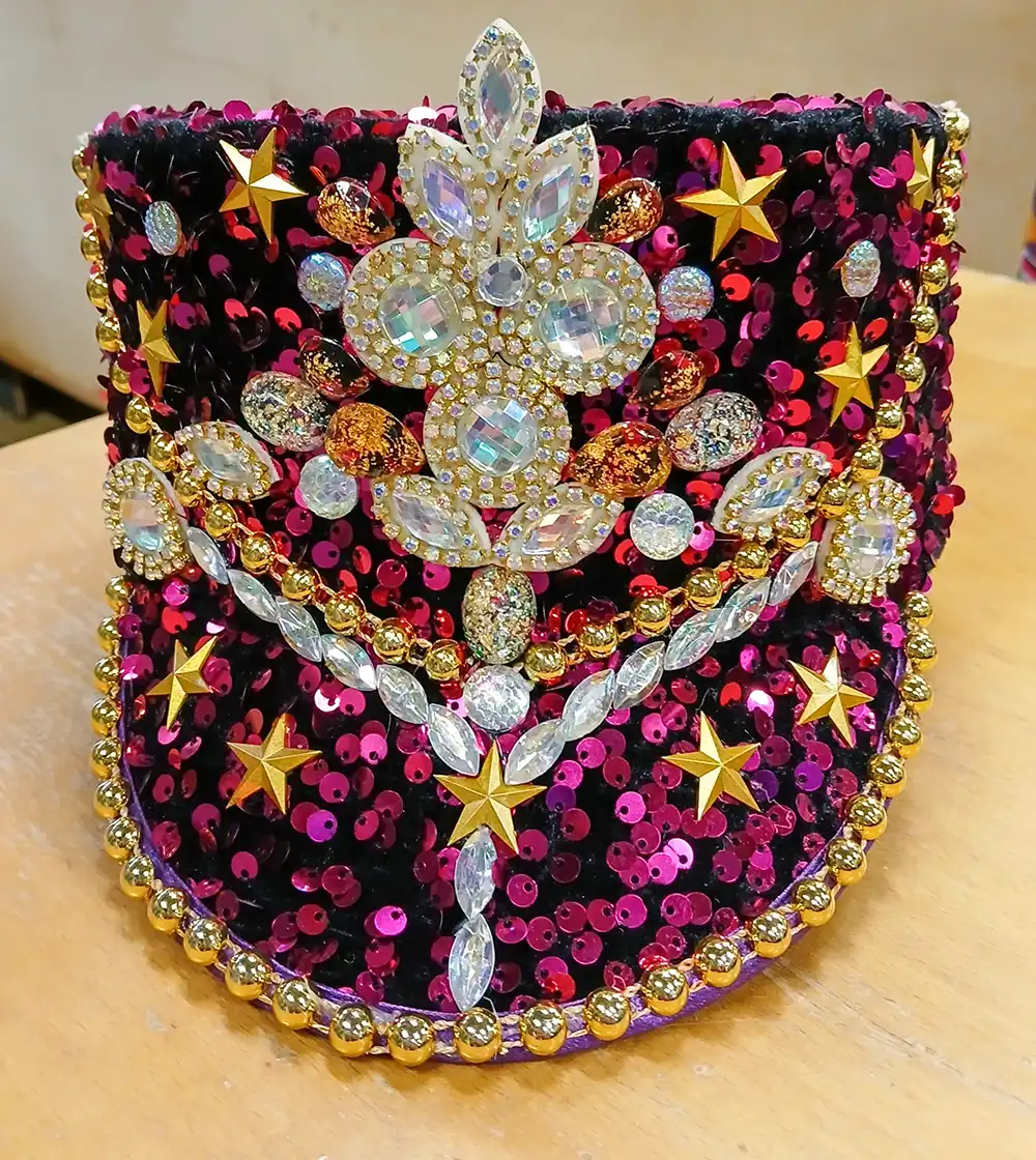 Roze glitterpet met pailletten en sterren